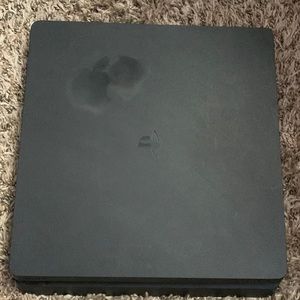 Playstation 4 slim for sale , comes with hdmi cords & in great condition !